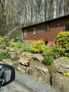 Side view of timber lodge on edge of Wyre Forest